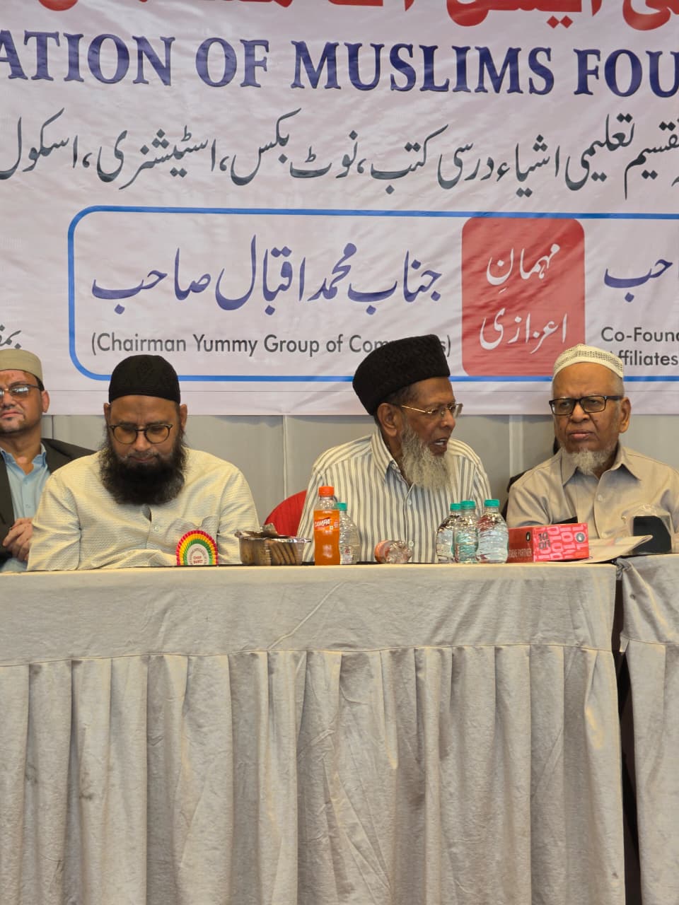 Members and guests on the dais
